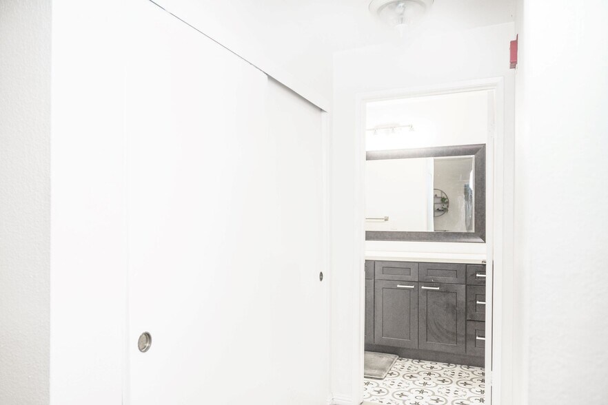 To right of kitchen hallway to new bathroom 2 - 10021 Tabor Street