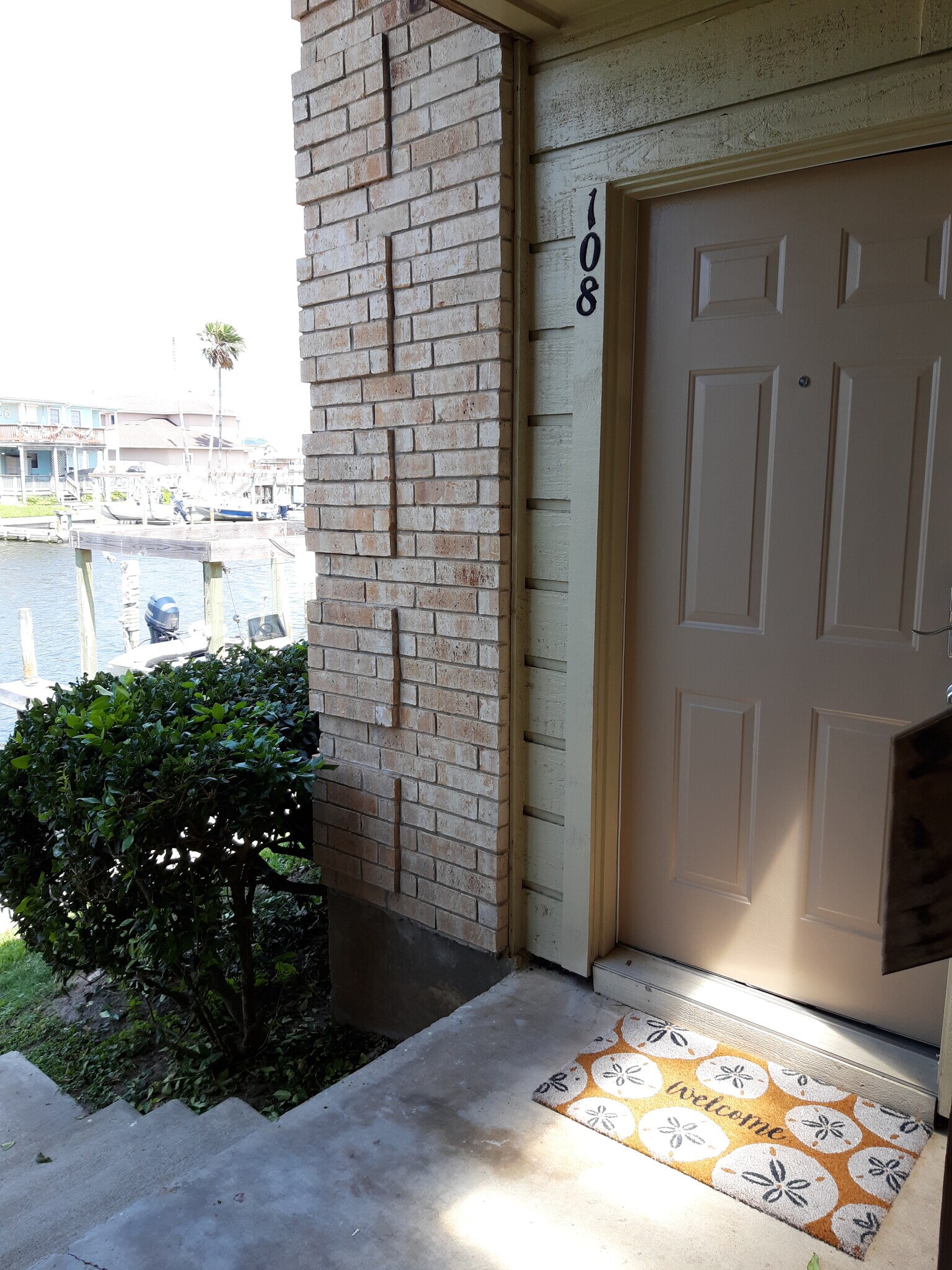 Front door, canal side - 15421 Seamount Cay Ct
