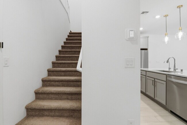 Building Photo - Experience refined living in this beautifully appointed 3-bedroom, 2.5-bathroom townhome spanning...