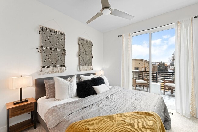 Building Photo - Modern 2-Bedroom Rowhome with Rooftop Moun...