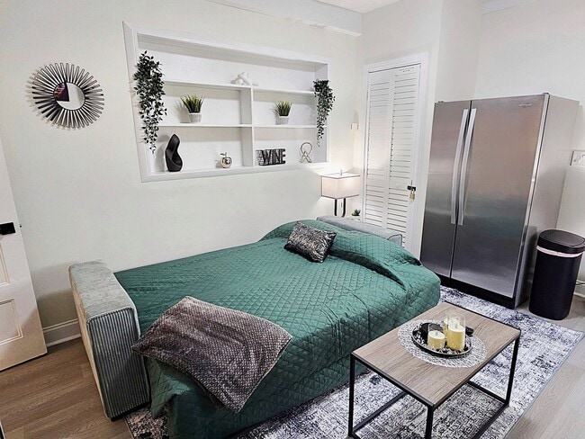 Building Photo - Fully Furnished: Beautiful 4-Bedroom Home ...