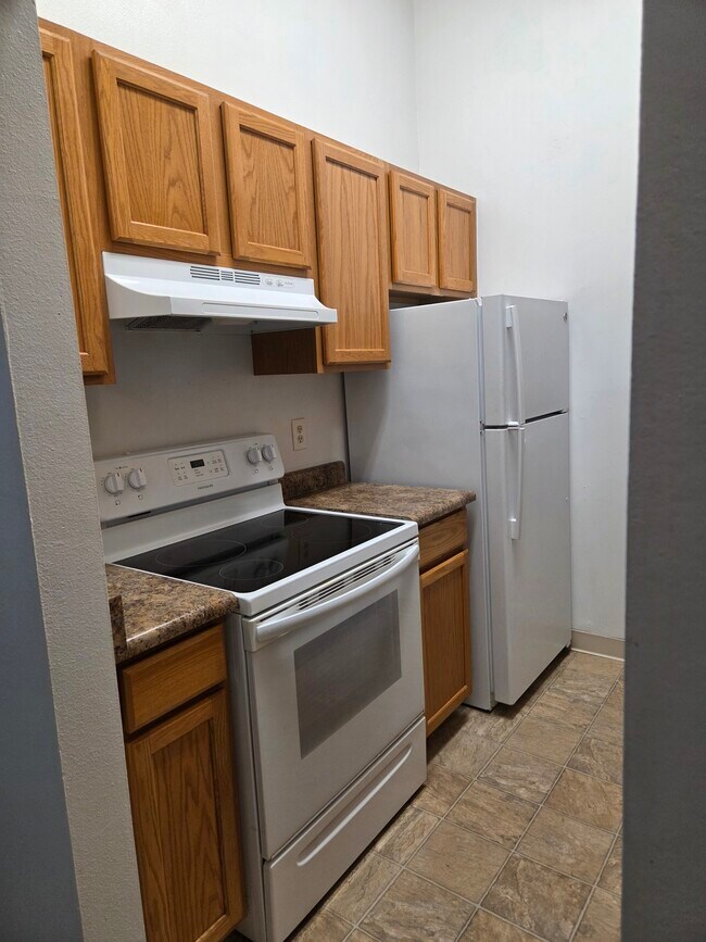 Building Photo - Stonecreek Park Condominiums