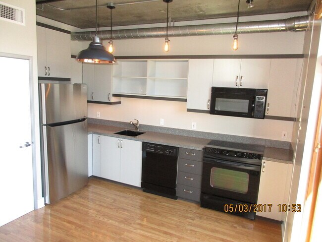 Building Photo - Old Town Lofts - East facing studio w/balc...