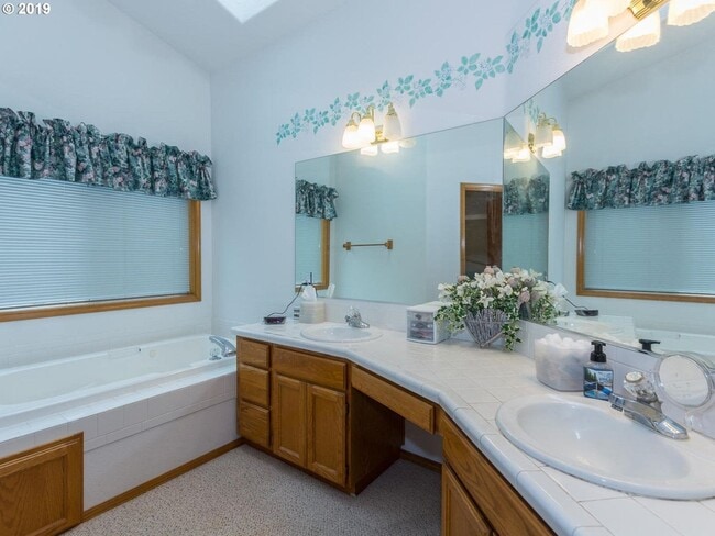 Building Photo - Charming 4-Bed, 2-Bath Home with Vaulted Ceilings, Dual Fireplaces & Serene Outdoor Spaces