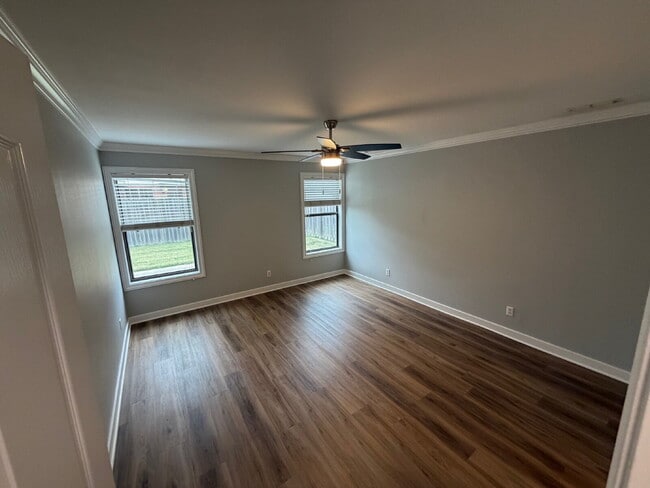 Building Photo - Elegant, Low Maintenance Townhome Designed for Elevated Everyday Living!