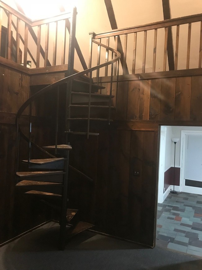 Den with Spiral Stairs - 596 S Main St