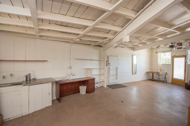 Building Photo - Bring Your Crew. Take the Whole Compound