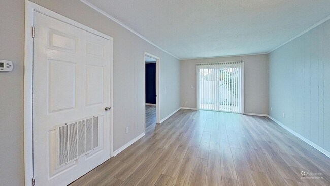 Building Photo - MOVE IN SPECIAL $500 OFF FIRST MONTH!! Beach Living at it's Best!  Two Bedroom/One Bath Ground Fl...