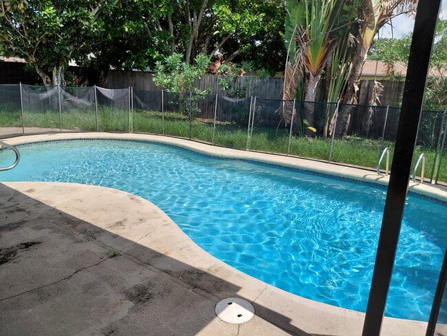 Pool with child safety fence - 636 Tulane Ave