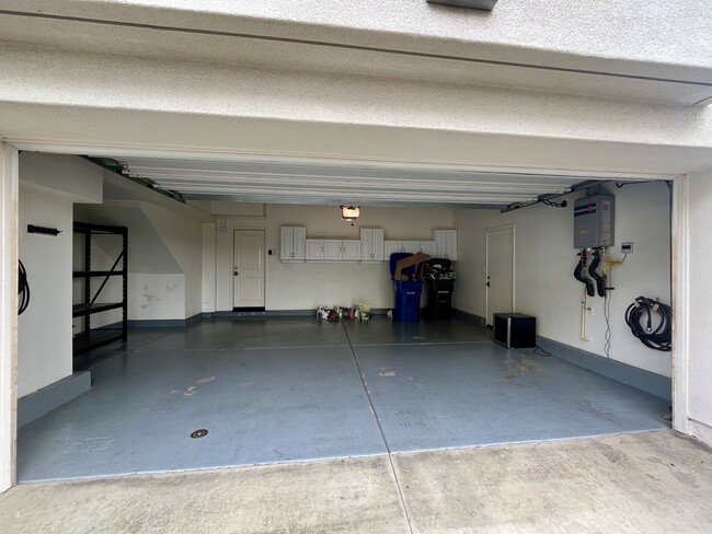 Large private garage with direct access to unit and storage. - 5256 Pacific Ter