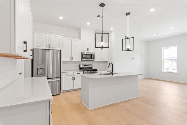 Building Photo - Welcome home to this stunning brand-new townhome in one of Indian Trail's newest and most desirab...