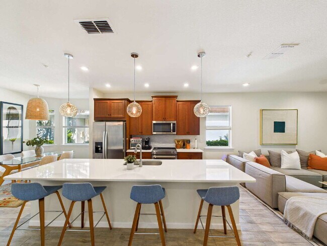 Building Photo - Relax and Unwind in This Beautiful Arboretum Condo Near Downtown Naples – 3-Month Minimum Rental