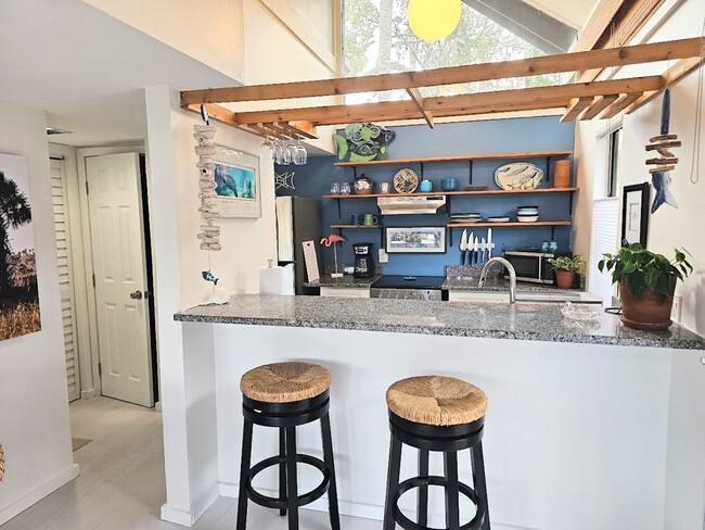 Building Photo - Furnished Waterfront Bungalow with Pool Access