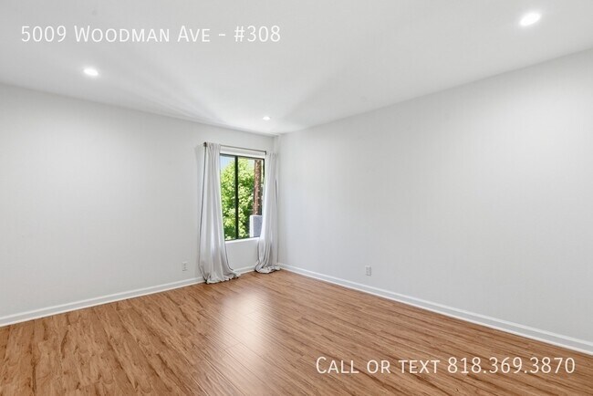 Building Photo - 5009 Woodman Ave