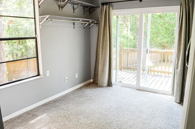 Building Photo - Check out this huge private fenced back yard at this Timberlane home!