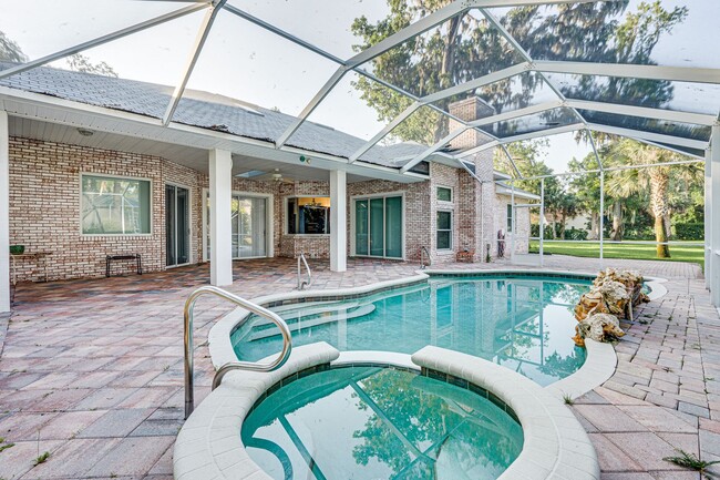 Building Photo - 4/3 Pool Home in Halifax Plantation