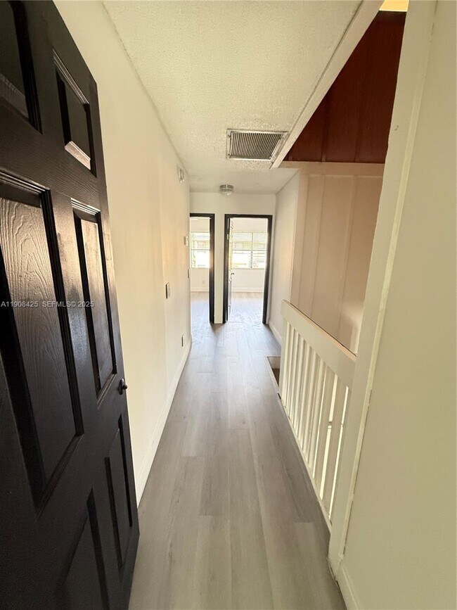 Building Photo - 9986 Royal Palm Blvd