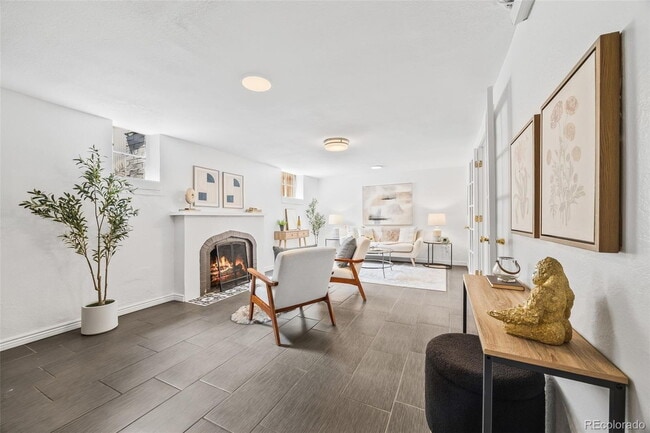 Building Photo - "Spacious 5-Bedroom Gem with Hardwood Floors & Cozy Fireplace in Denver's Heart!"