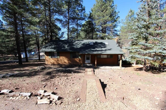 Building Photo - 3 Bed, 2 Bath Cabin Home with Fenced Backyard & Balcony | Kachina Village