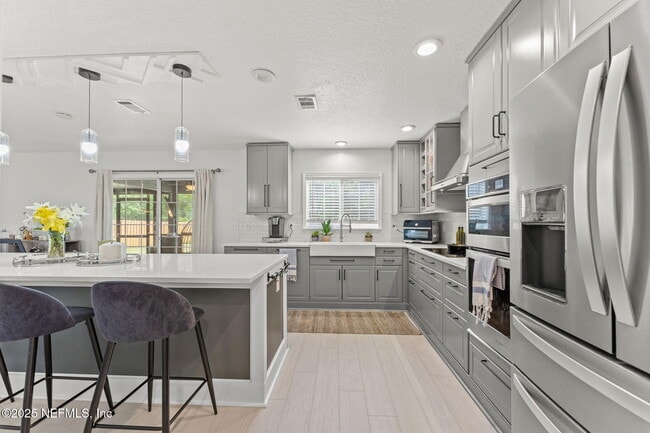 Building Photo - 75309 Ravenwood Dr