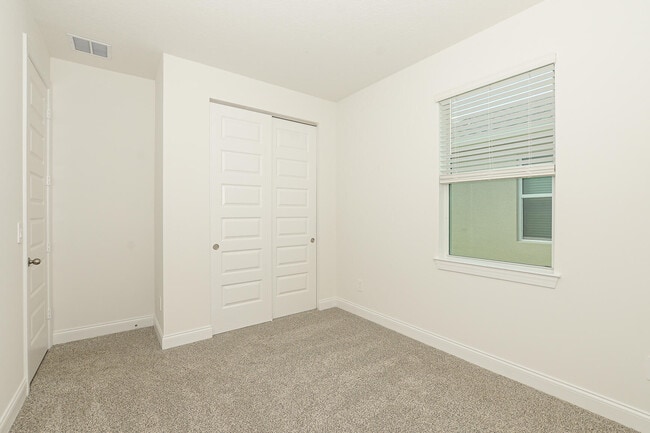 Building Photo - 9062 Dahlia Cir