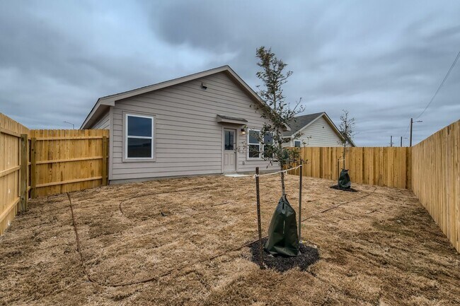 Building Photo - Beautifully Designed4-Bedroom Home with Open-Concept Living in a Prime Location