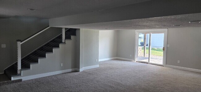 Building Photo - Charming 4-Bedroom Haven with Hardwood Elegance on Main St, New Prague!