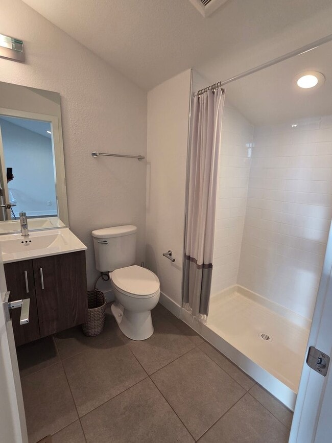 Building Photo - STUNNING 4-LEVEL TOWNHOME IN HIGHLANDS WITH SAUNA, 2-CAR GARAGE + AMAZING ROOFTOP DECK!