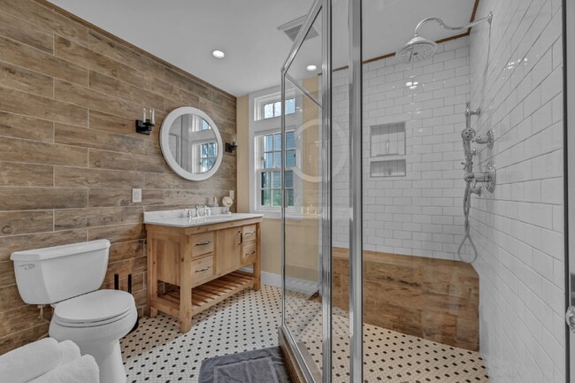 Building Photo - Furnished 1-Bedroom Lower Apartment on Main St