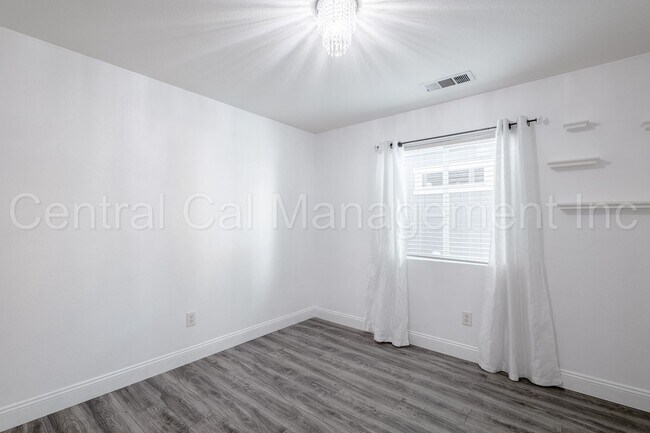 Building Photo - 3 Bedroom/2 Bath with a Pool and Solar - $...