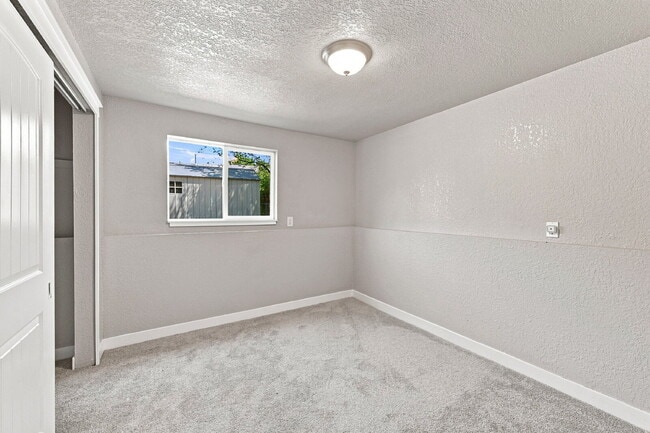 Building Photo - $2,095.95, 4 bed, 2 bath, located in Colorado Springs with a fenced-in backyard.