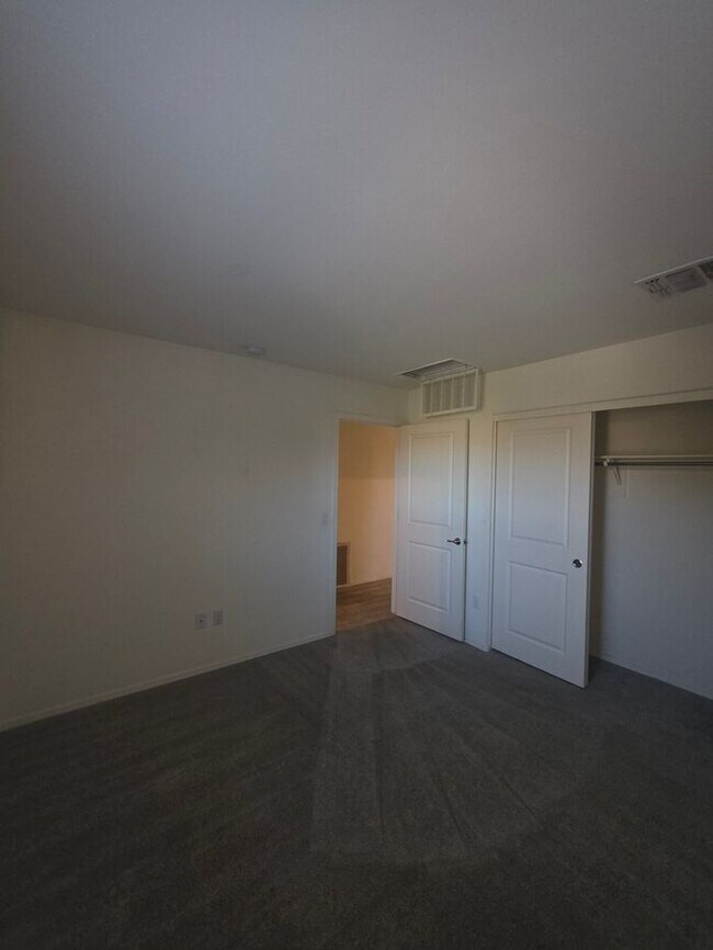 Building Photo - COMING SOON! New 3BR 2 BA Home w/ 2-Car Garage • Stainless Kitchen • Timer-Irrigated Yard in East...