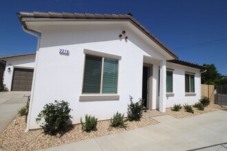 Building Photo - BRAND NEW with SOLAR Washer/Dryer/Fridge Included