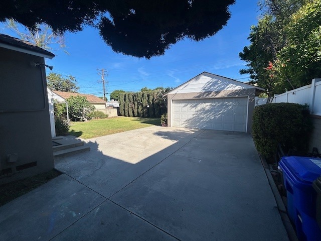 View from driveway into backyard - 11235 Lynrose St