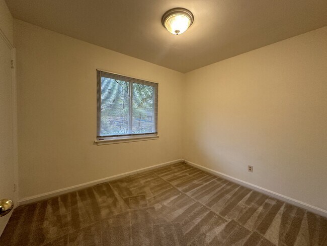 Building Photo - This classic brick rambler, located just around the corner from the West Falls Church Metro Stati...
