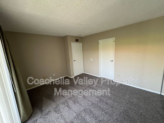 Building Photo - 1950 S Palm Canyon Dr