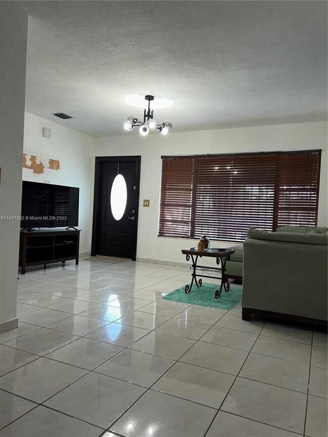 Building Photo - 5891 W 9th Ln