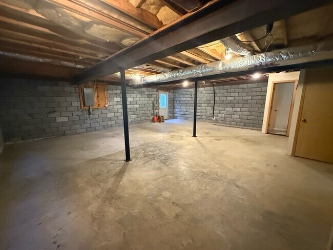 Building Photo - Spacious ranch, fenced yard, 2 car garage, large basement, near Wake Tech