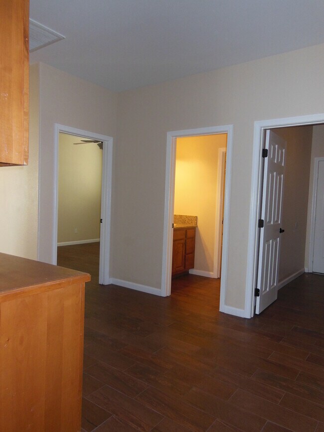 Building Photo - Swamp Cooler, Central AC and Tile Throughout!