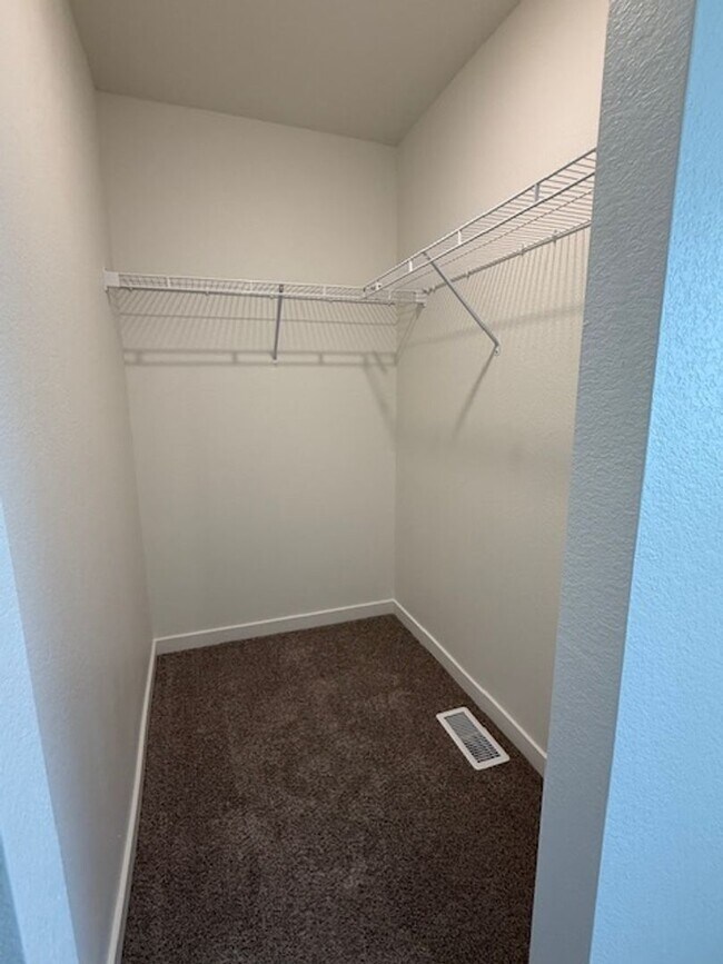 Building Photo - New 2 Bedroom Townhome + 2 Car Garage