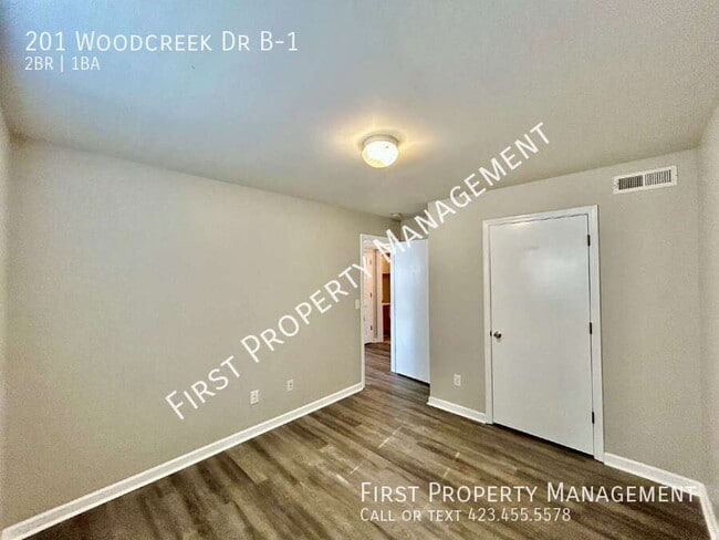 Building Photo - 201 Woodcreek Dr