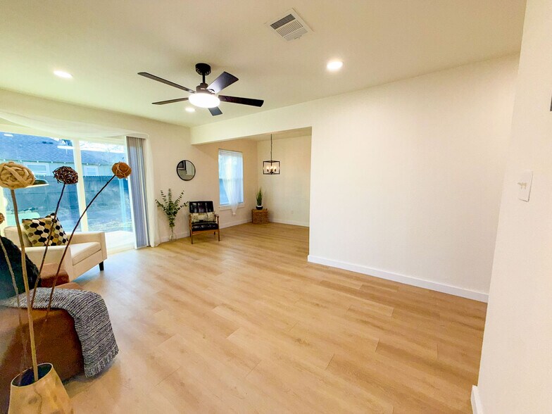 Hallway view of living room. - 308 E Bourn St
