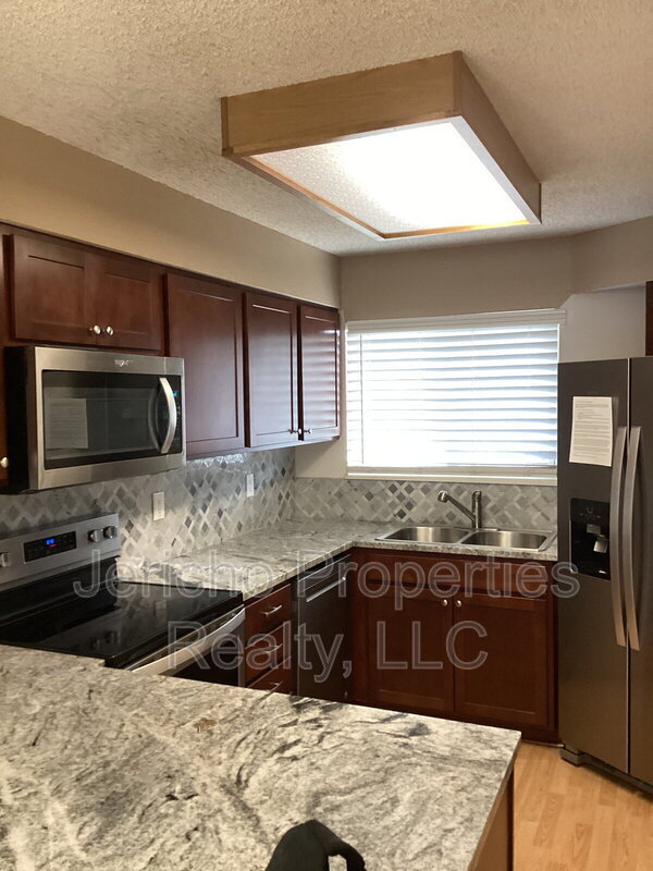 Building Photo - 8733 W Cornell Ave