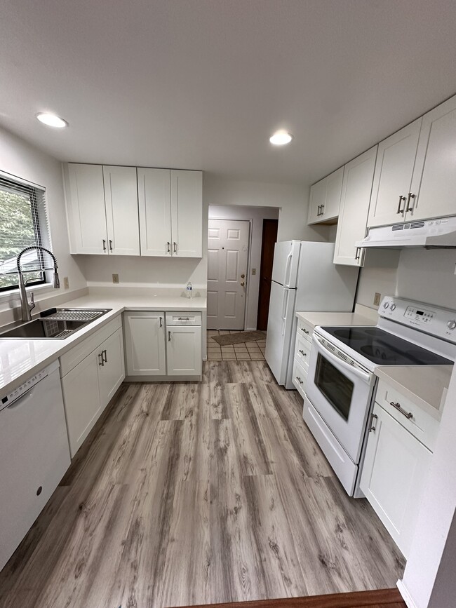 New Kitchen with new cabinets - Sunset Apartments