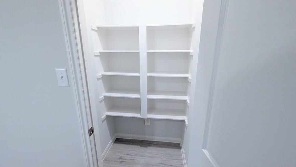 Large pantry located across from the kitchen. - 13218 HP Johnson St