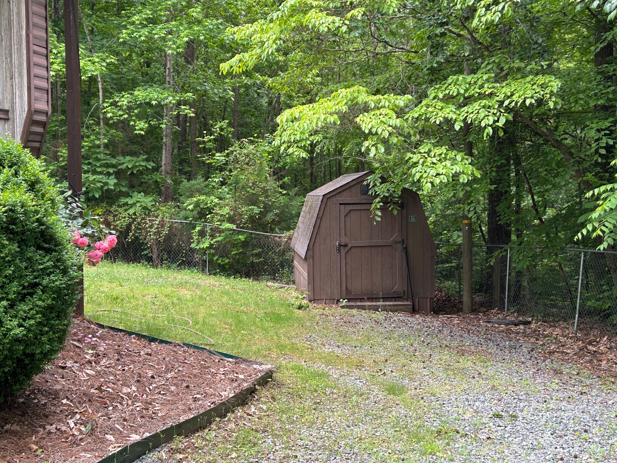 Back yard with wood building - 10975 E US Highway 64