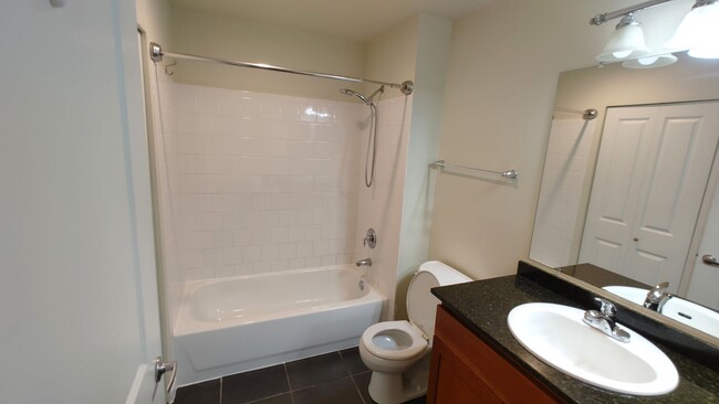 Building Photo - Private Second floor 1 bed 1 bath condo wi...