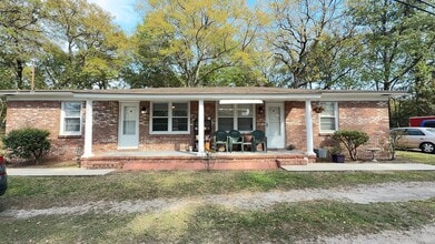 Building Photo - 2BR Duplex with Washer/Dryer + Fresh Updates + Lawn care included