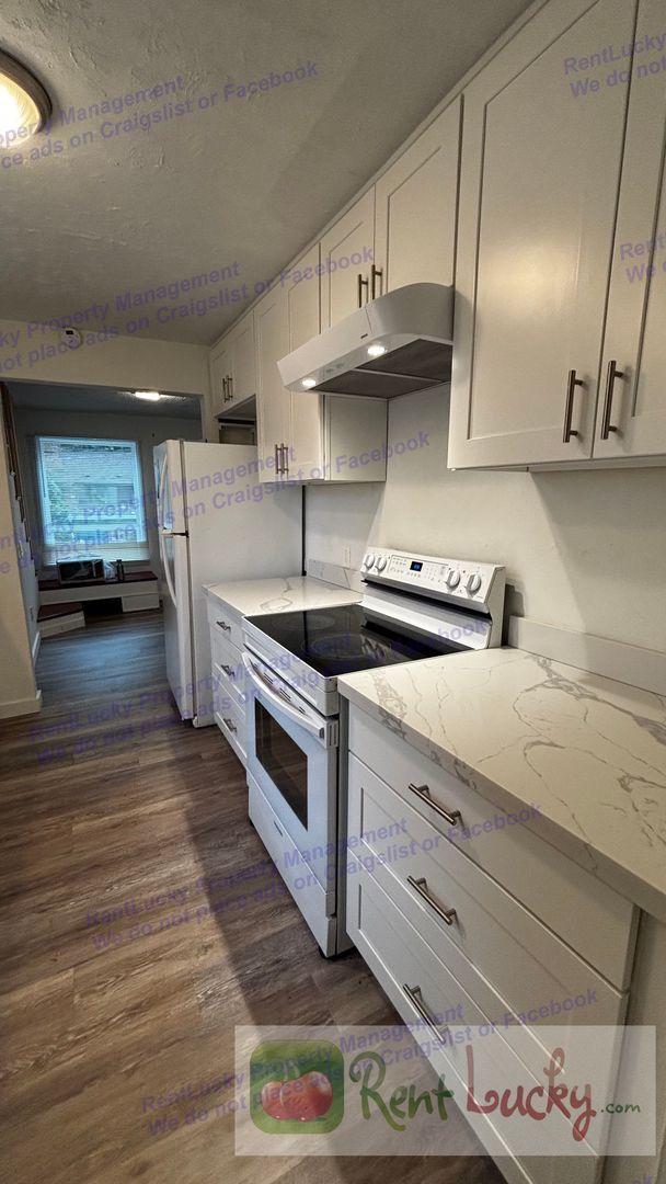 Building Photo - FREE JANUARY RENT | Amazing Finished Attic | Driveway Parking