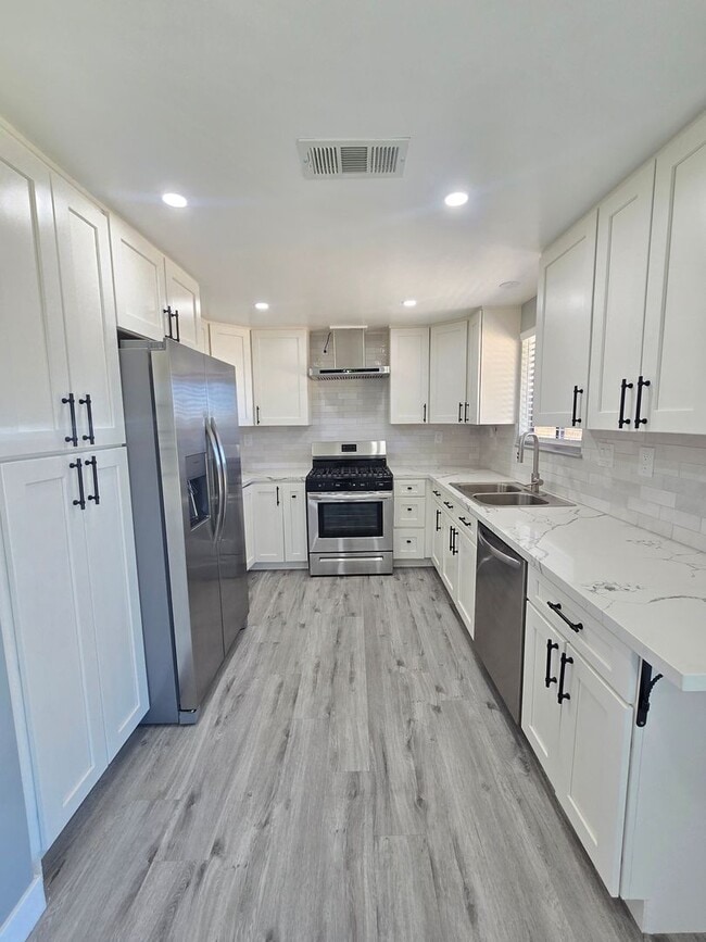 Building Photo - Fully Renovated 3 Bedroom & 2 bathroom Home with Huge Backyard – California City!